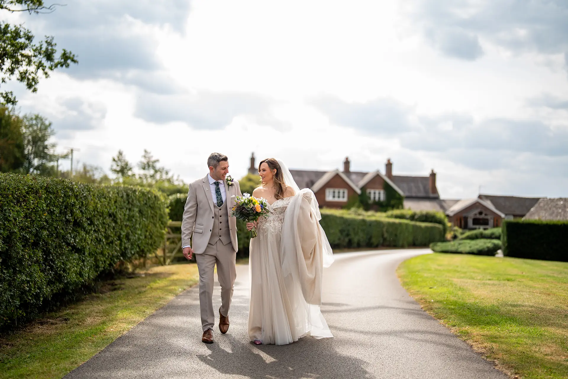sandhole oak barn couple on driveway